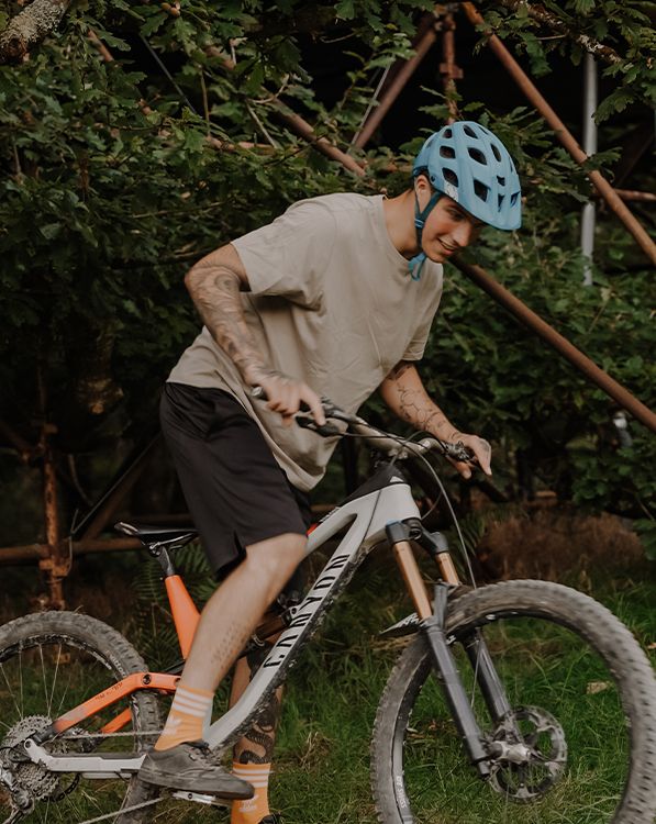 Man on a bike at Beudy Banc Treehouse