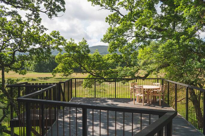 Dining area on the balcony overlooking the field