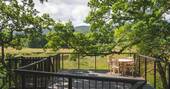 Dining area on the balcony overlooking the field