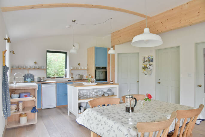 Open plan kitchen and dining area inside