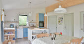 Open plan kitchen and dining area inside