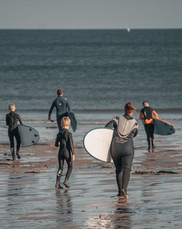 People surfing on a beach 