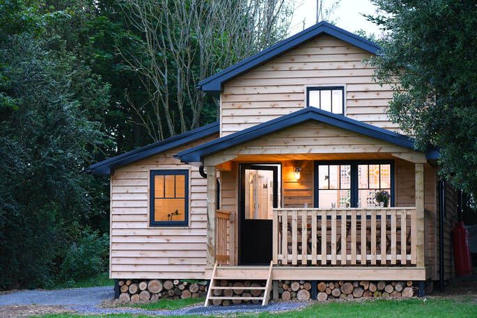 Walden Lodge cabin exterior with warm lighting 